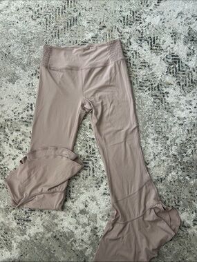 Free People Movement Mauve Flared Yoga Pants with Ruffle Hem